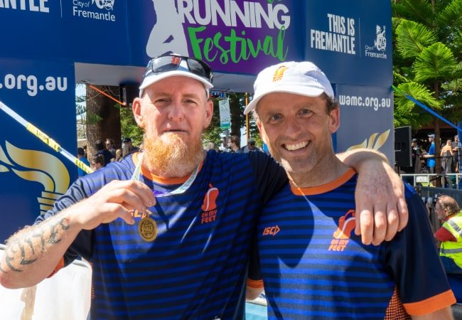 Keegan Crage with an On My Feet participant after the Fremantle fun run